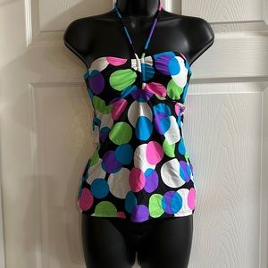 Top and bottom are size medium bottoms are solid black, top is black with circle